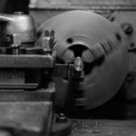 Grayscale Photo of a Lathe Machine